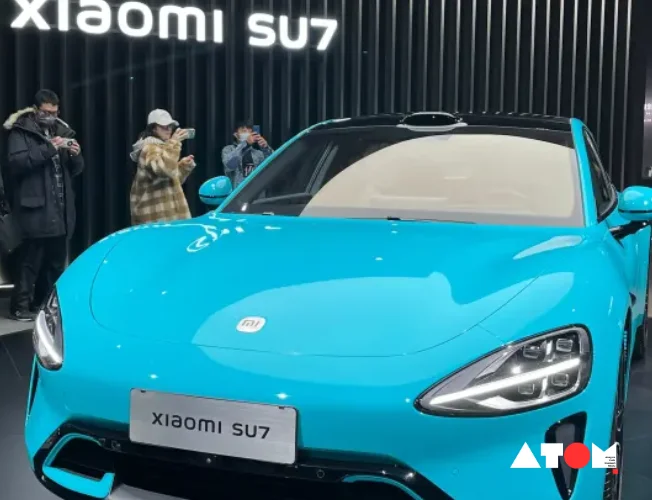 Xiaomi unveils its electric car, the SU7, in India with no immediate plans for launch. The showcase in Bengaluru highlights Xiaomi's expansion beyond smartphones, emphasizing its diversified product portfolio. The SU7 boasts competitive pricing and impressive range, signaling Xiaomi's potential impact on the Indian EV market.