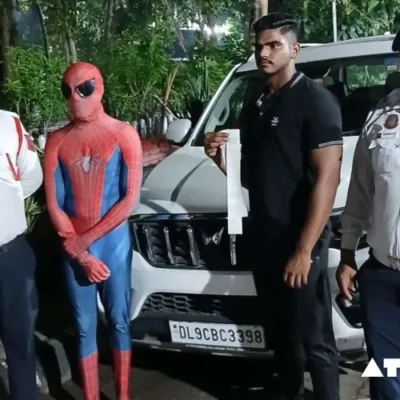 A man dressed as Spider-Man was arrested in Delhi for riding on the bonnet of a car. The incident was caught on video and went viral, prompting a strong response from Delhi Traffic Police.