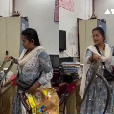 A daring snake catcher's calm and collected demeanor as she removes a snake from an office has gone viral. Witness the incredible moment a fearless woman saves the day in this must-watch video.